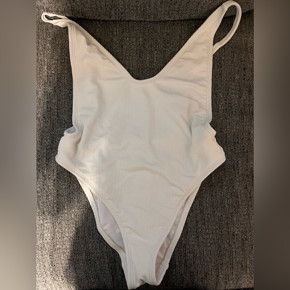 White one piece swim suit. Size: XS